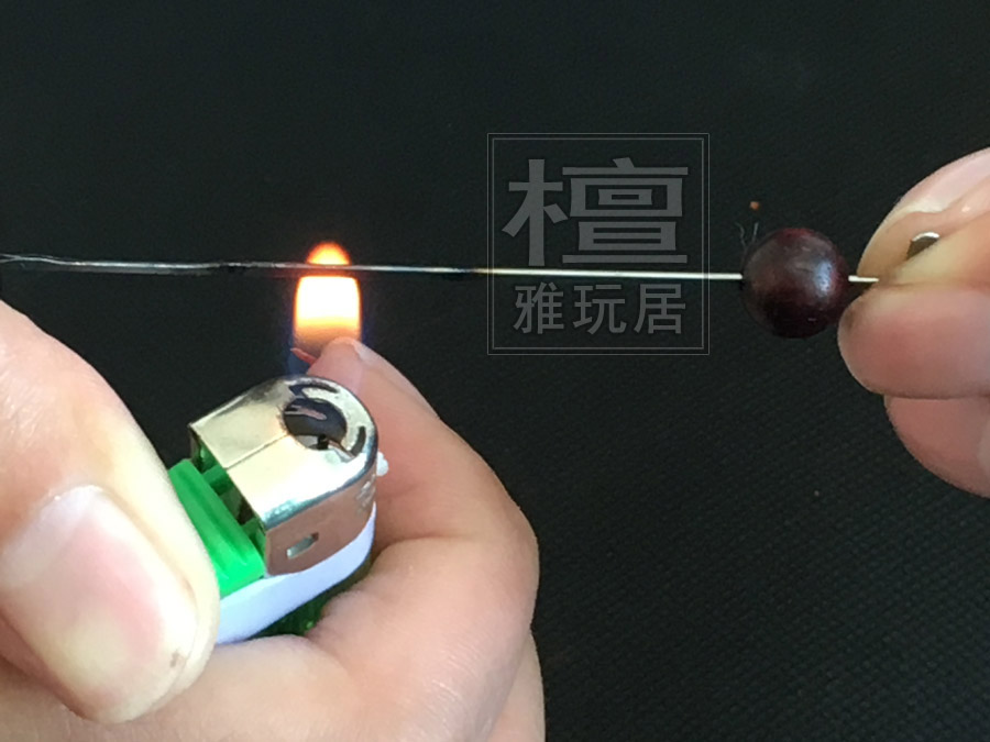 把钩针烧热